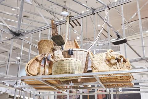 Muji Yurakucho  – overhead displays of baskets and gardening tools